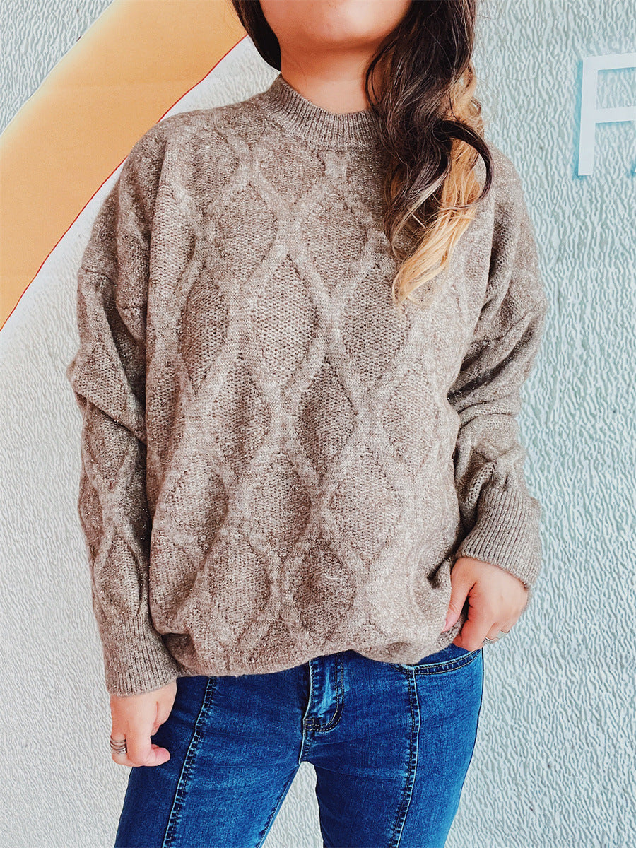 Pull en grosse maille pour dames avec un élégant motif en losange et des manches volumineuses Chic und Stil