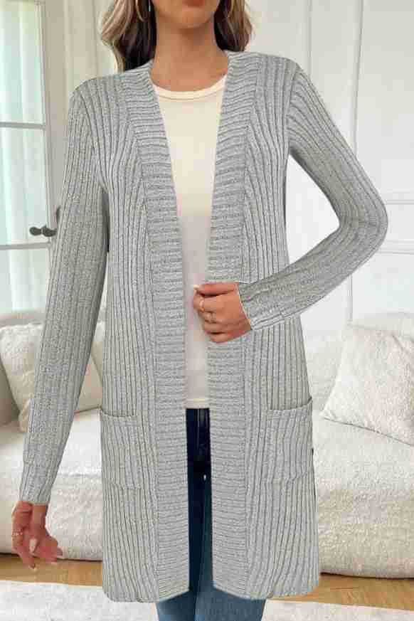 Veste tricotée longue pour femmes avec poches latérales et design texturé Chic und Stil