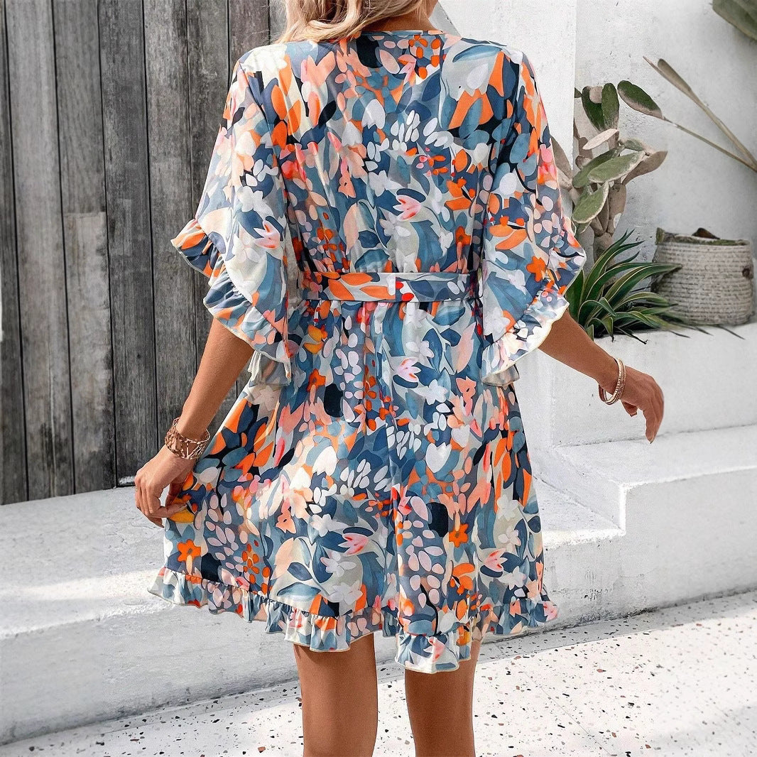 Robe portefeuille pour femmes avec motifs floraux et manches aérées Chic und Stil