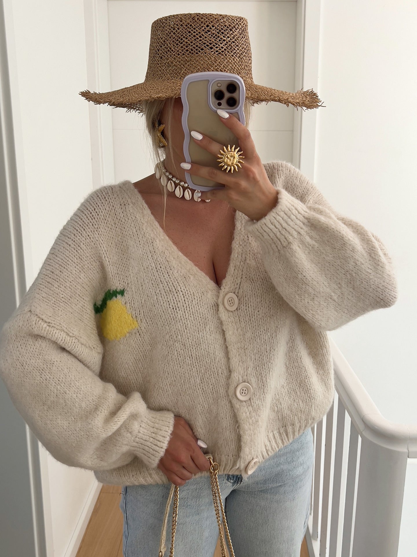 Cardigan à mailles épaisses pour femmes avec un motif de citron unique et une fermeture à boutons Chic und Stil