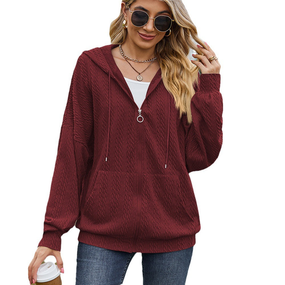 Dames Pull à capuche surdimensionné avec motif texturé et poches pratiques Chic und Stil