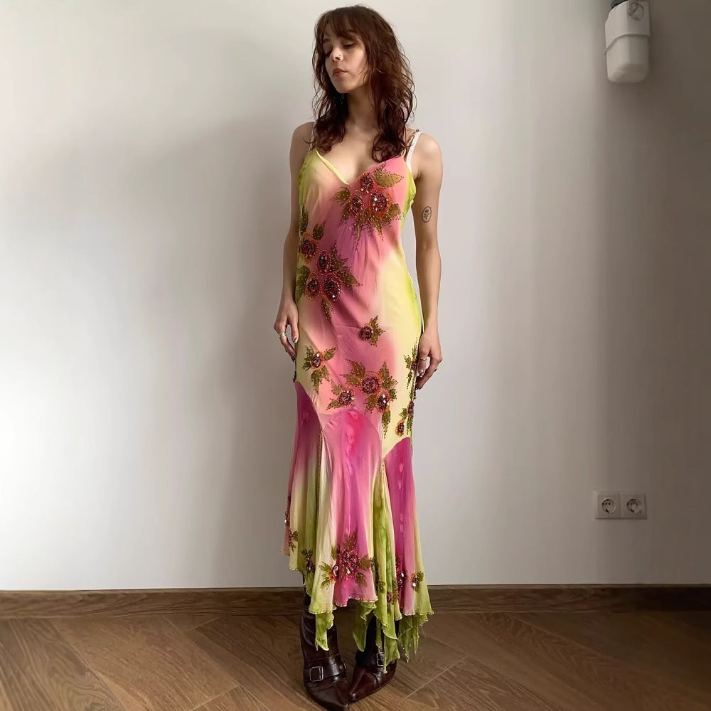Robe d'été asymétrique pour femmes avec un design floral et de délicates bretelles spaghetti Chic und Stil