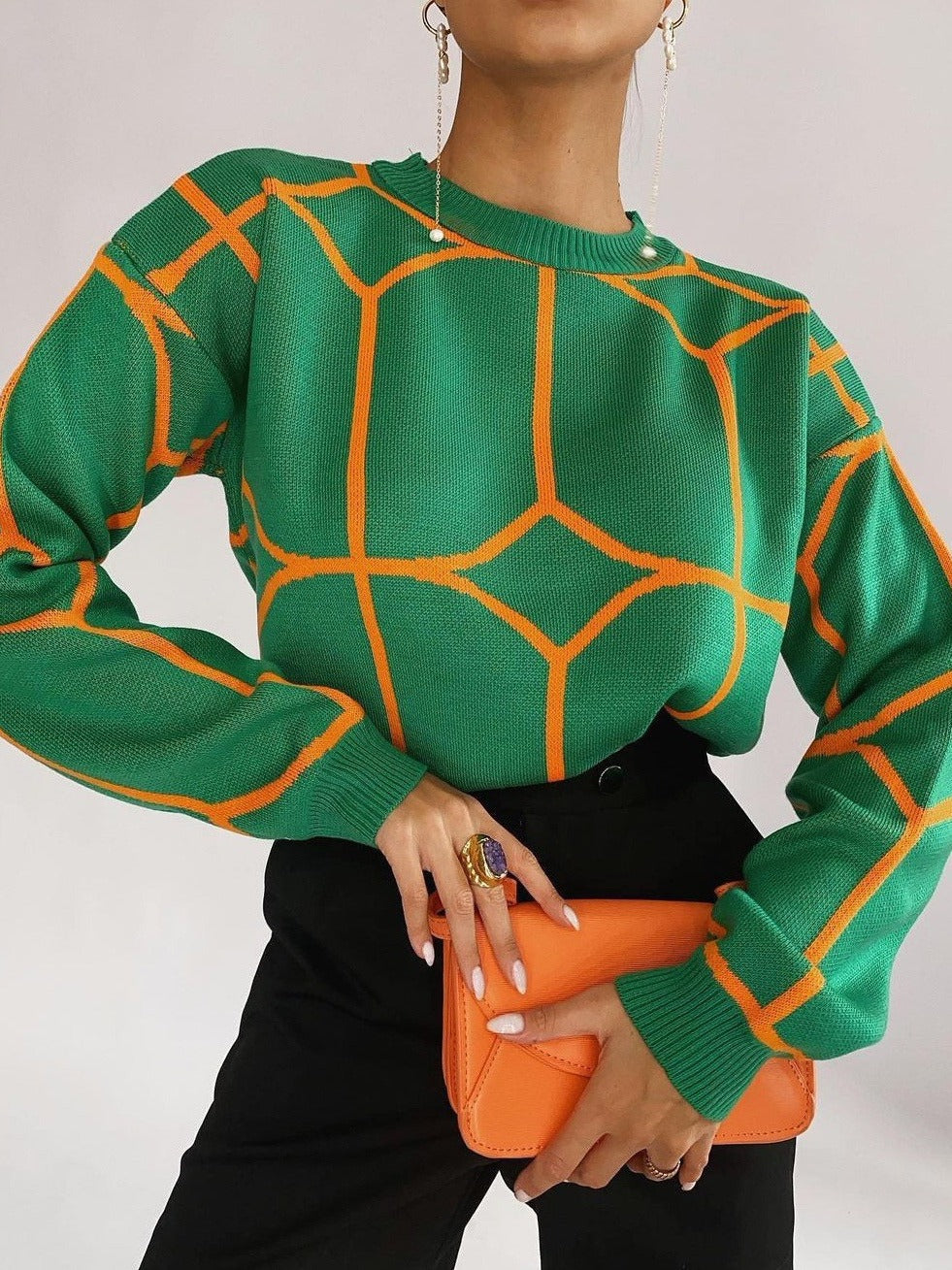 Pull en maille tendance pour femmes avec un design géométrique accrocheur Chic und Stil