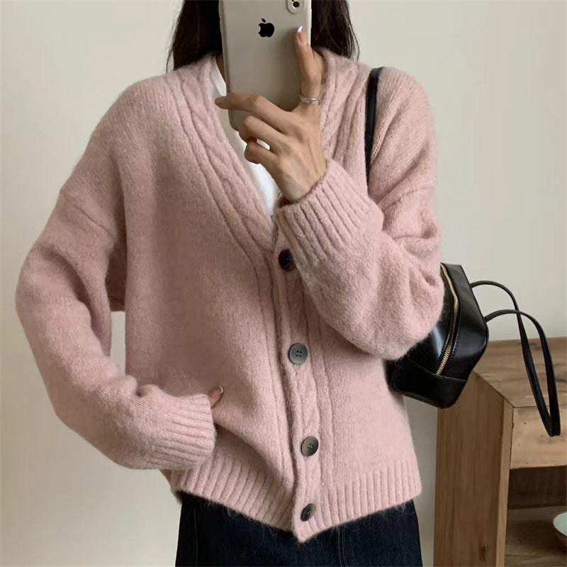 Dames Pull-over en tricot confortable avec un élégant décolleté en V et des détails de bouton Chic und Stil