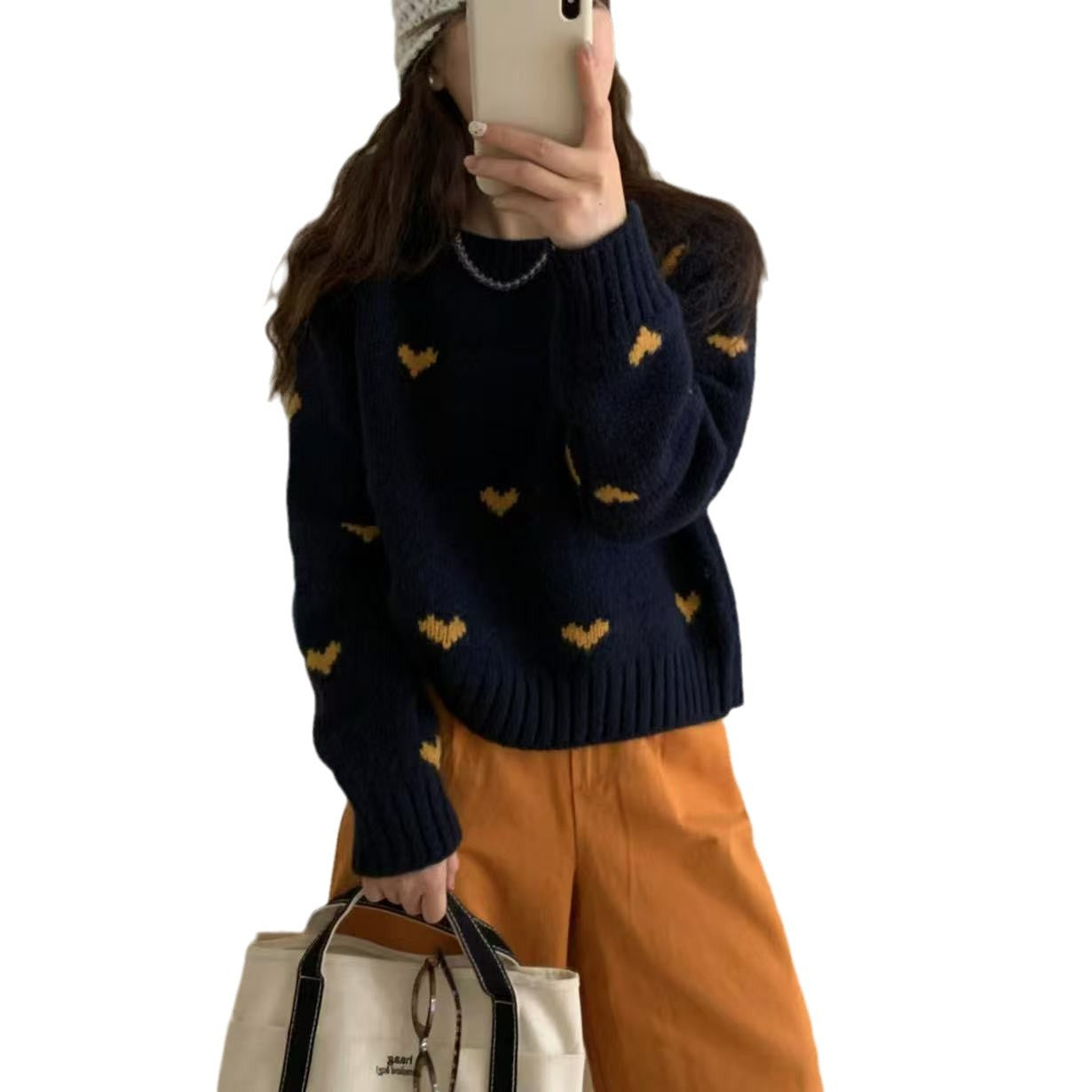 Femmes pull tricoté avec motif cœur et large bande Chic und Stil