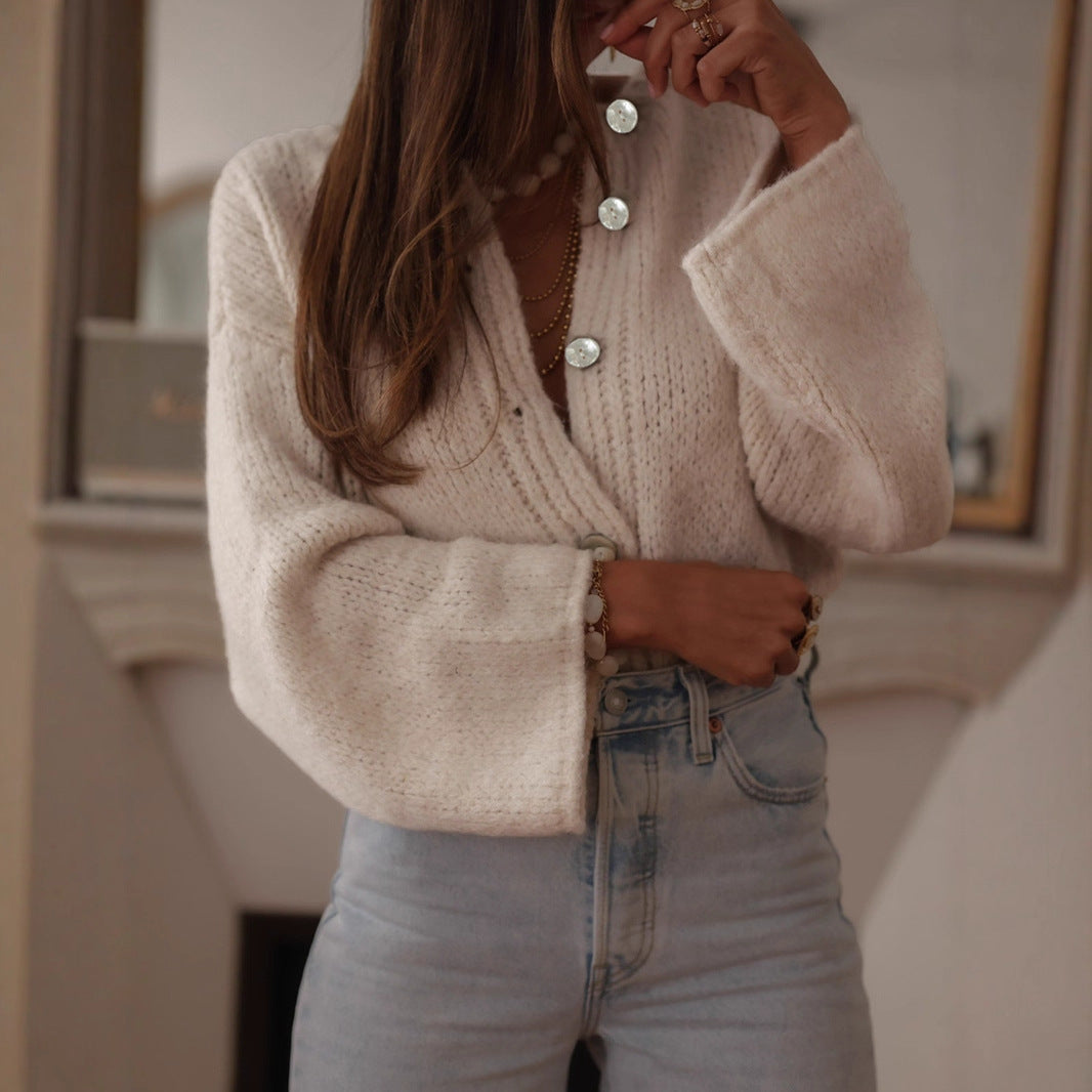 Dames pull-over confortable avec des manches surdimensionnées et de élégants boutons en perles Chic und Stil