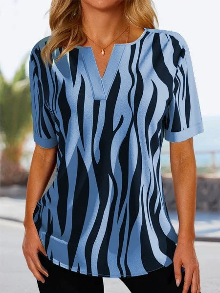 Tunique femme avec un motif de vagues moderne et décolleté en V Chic und Stil