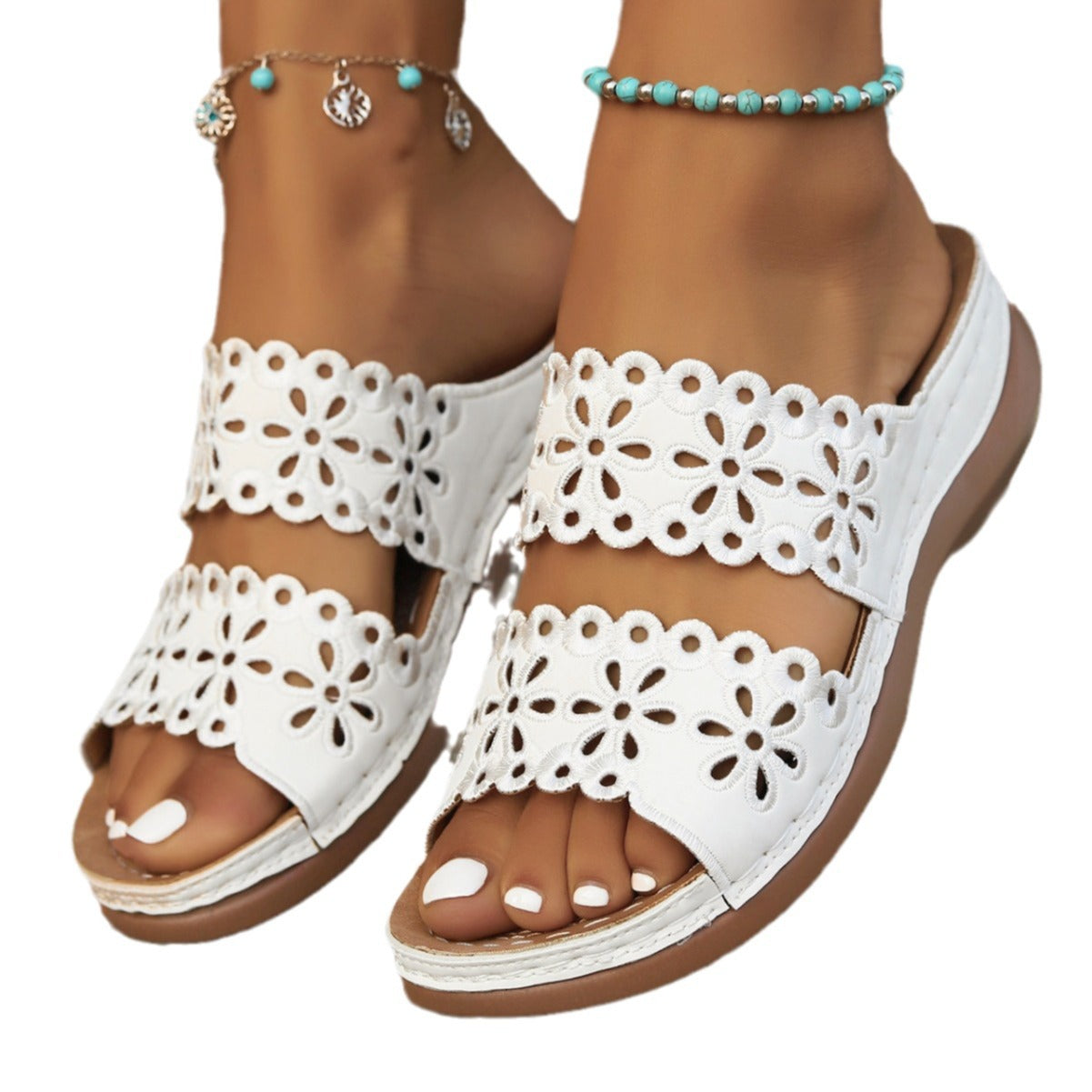 Sandales confortables pour dames avec des détails floraux et une semelle antidérapante Chic und Stil