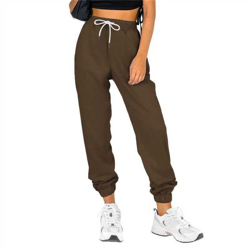 Pantalon d'entraînement pour femme avec taille élastique et coupe décontractée Chic und Stil