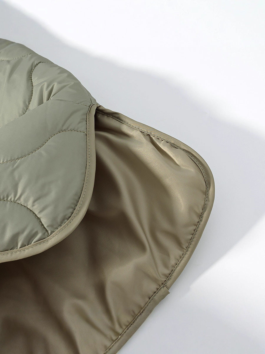 Quilted transition jacket for women with a soft fabric texture and practical snap buttons Chic und Stil