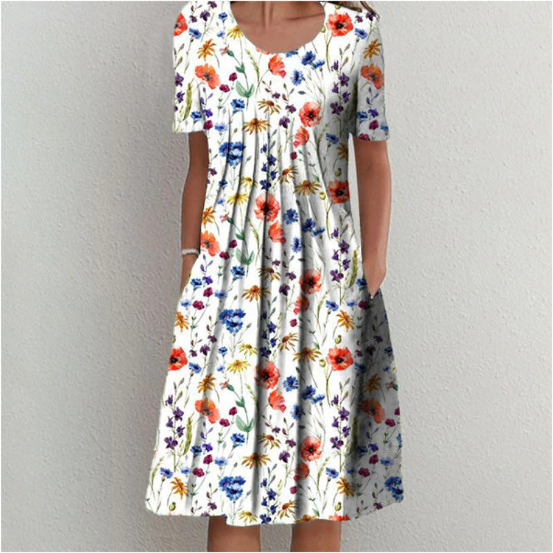 Robe midi femme à fleurs avec design plissé Chic und Stil