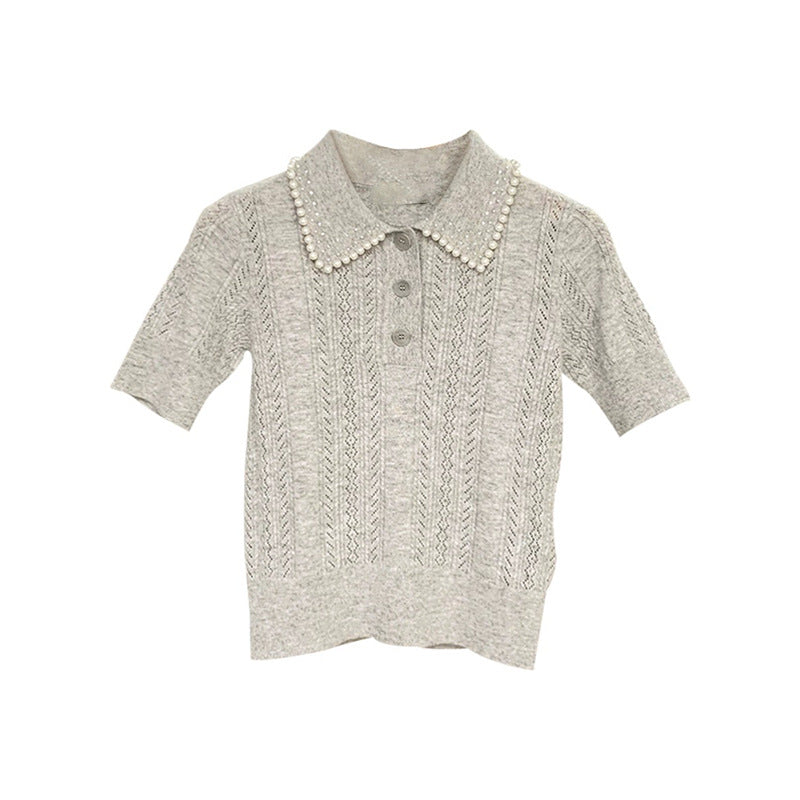 Top polo en tricot texturé pour femme avec détail en perles Chic und Stil