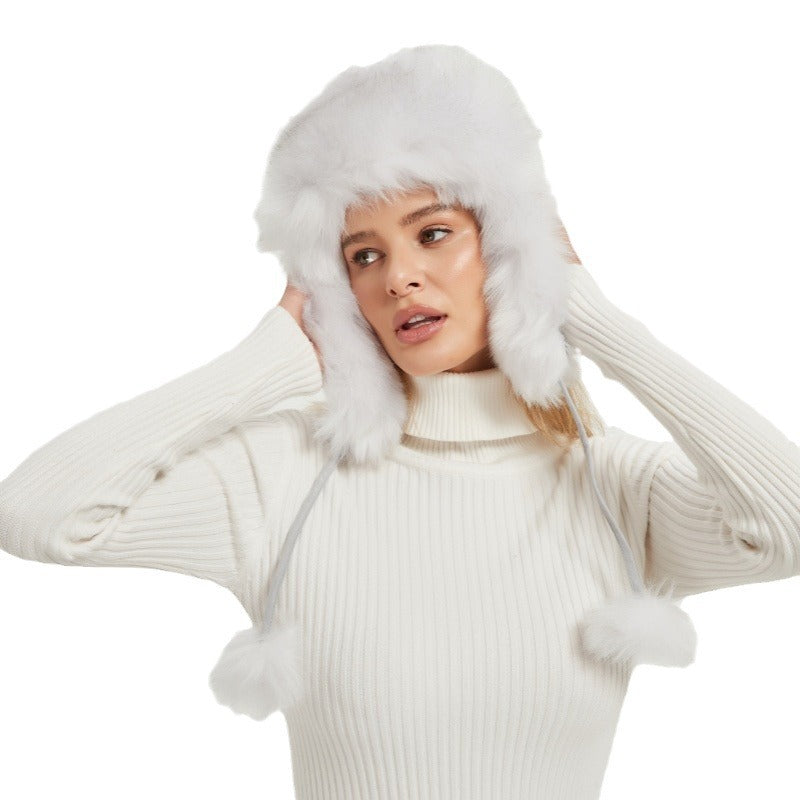 Dames Bonnet d'hiver en fourrure avec oreilles d'animaux et design volumineux Chic und Stil