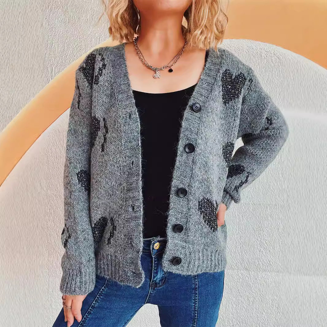 Cardigan en tricot pour femmes avec motif en forme de cœur et détails de boutons Chic und Stil