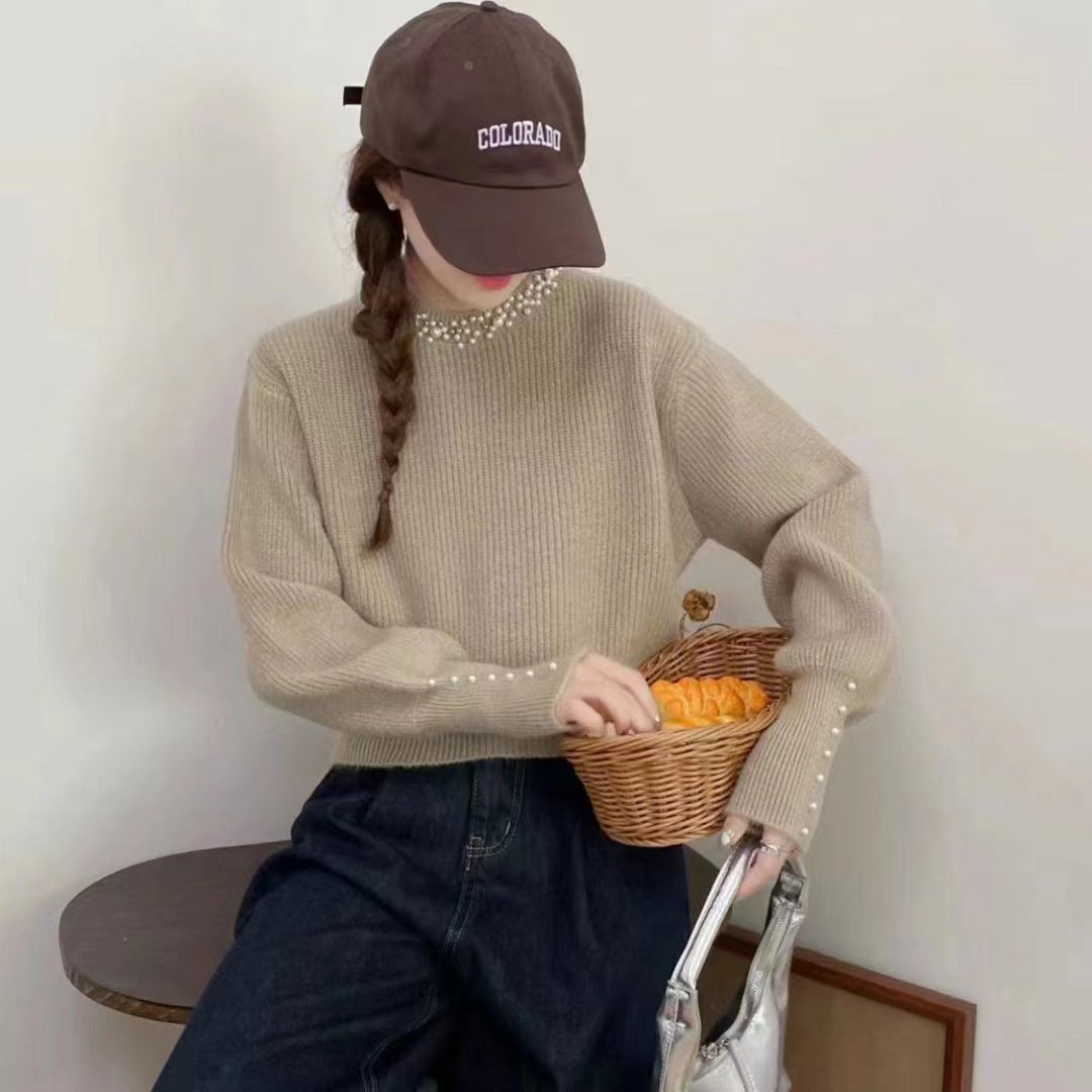 Dames pull élégant avec des détails ornés de perles Chic und Stil