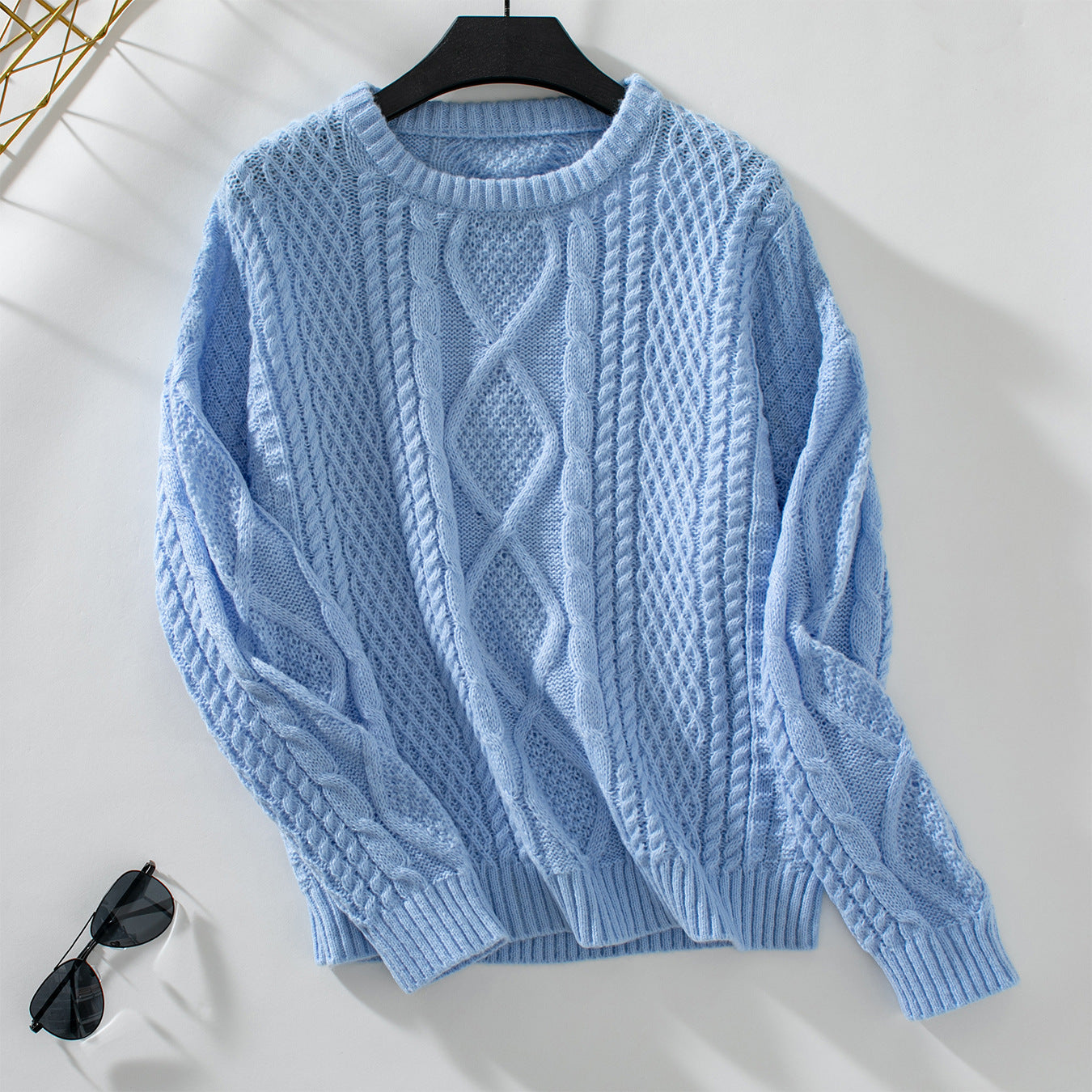 Pull en tricot pour femmes avec design en torsades texturées et col rond Chic und Stil