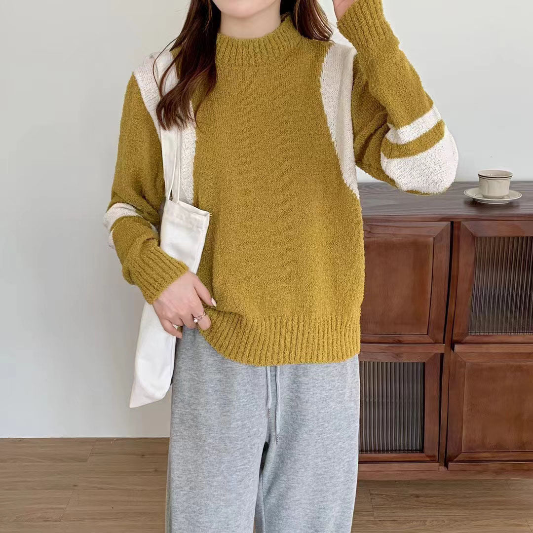 Pull femme avec col montant et manches contrastantes Chic und Stil