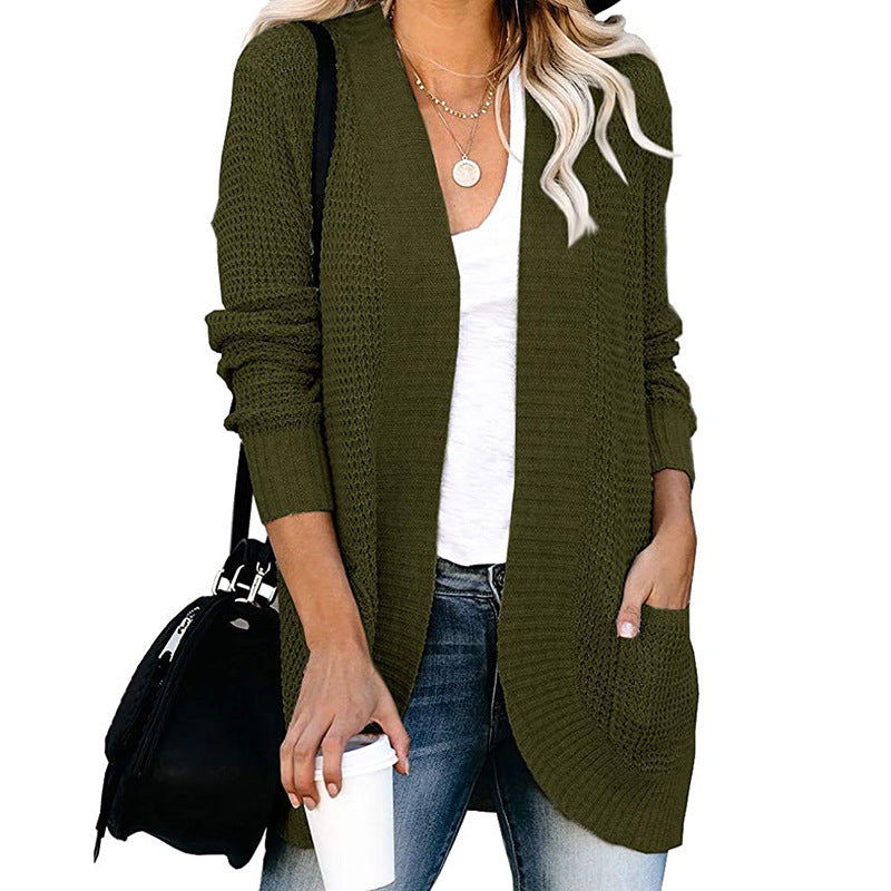 Veste en tricot pour femmes avec un motif de tricot moderne et des poches pratiques Chic und Stil