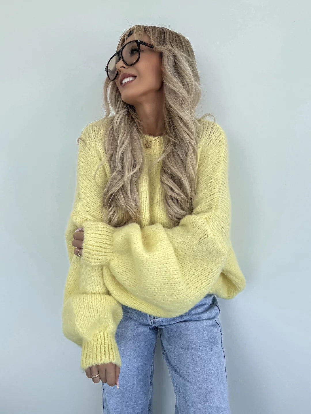 Pull en tricot pour femmes avec des manches volumineuses et une texture fine Chic und Stil