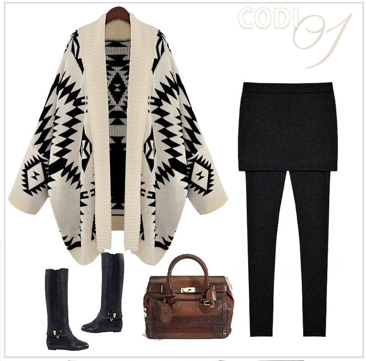 Poncho en tricot pour femmes avec un motif géométrique frappant Chic und Stil