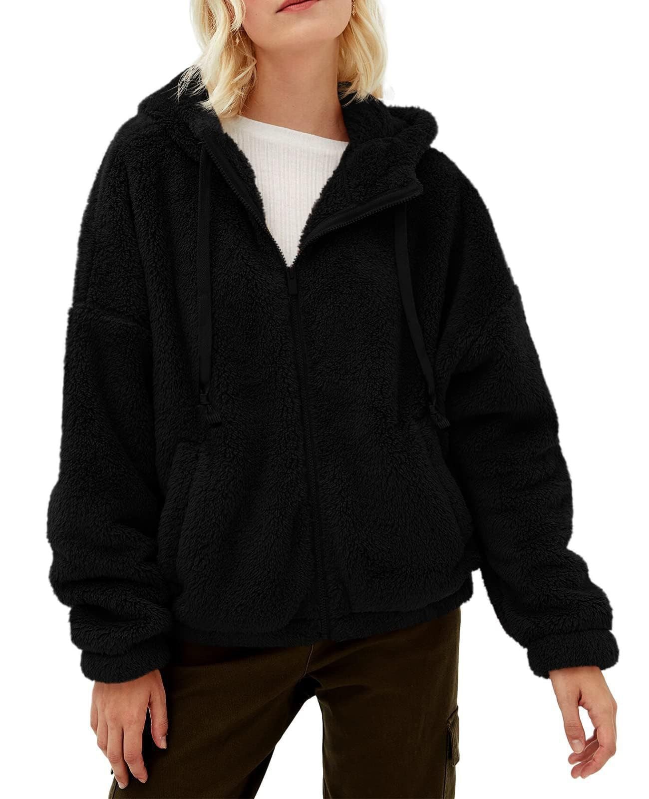 Dame Veste à capuche en fausse fourrure au style oversize Chic und Stil