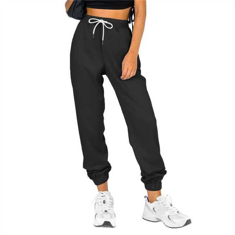 Pantalon d'entraînement pour femme avec taille élastique et coupe décontractée Chic und Stil