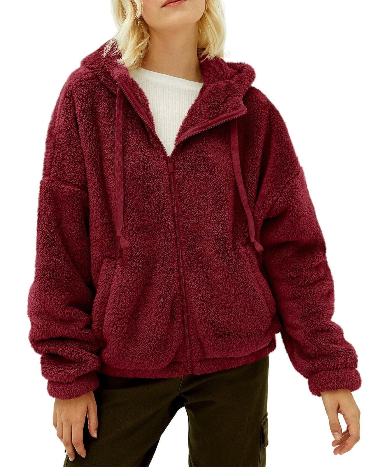 Dame Veste à capuche en fausse fourrure au style oversize Chic und Stil