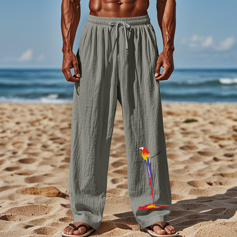 Light beach pants for men with colorful parrot design Chic and Style