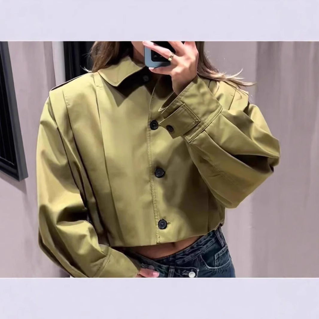 Blouse cintrée féminine à détails de boutons continus Chic und Stil