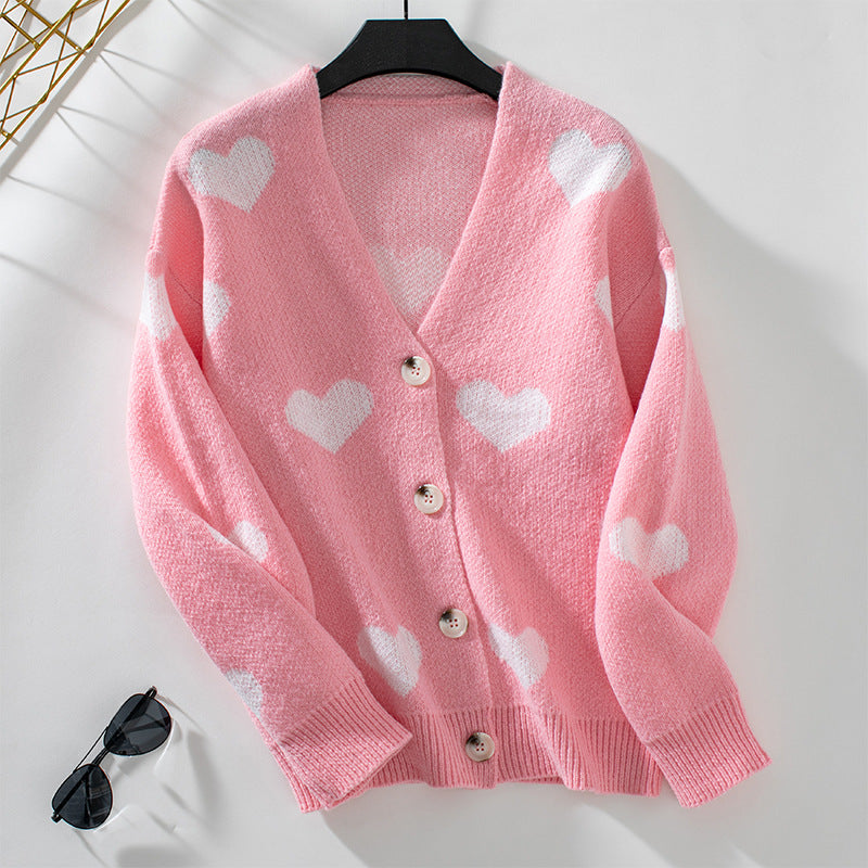 Veste en tricot mode pour femmes avec motifs de cœurs et boutons Chic und Stil