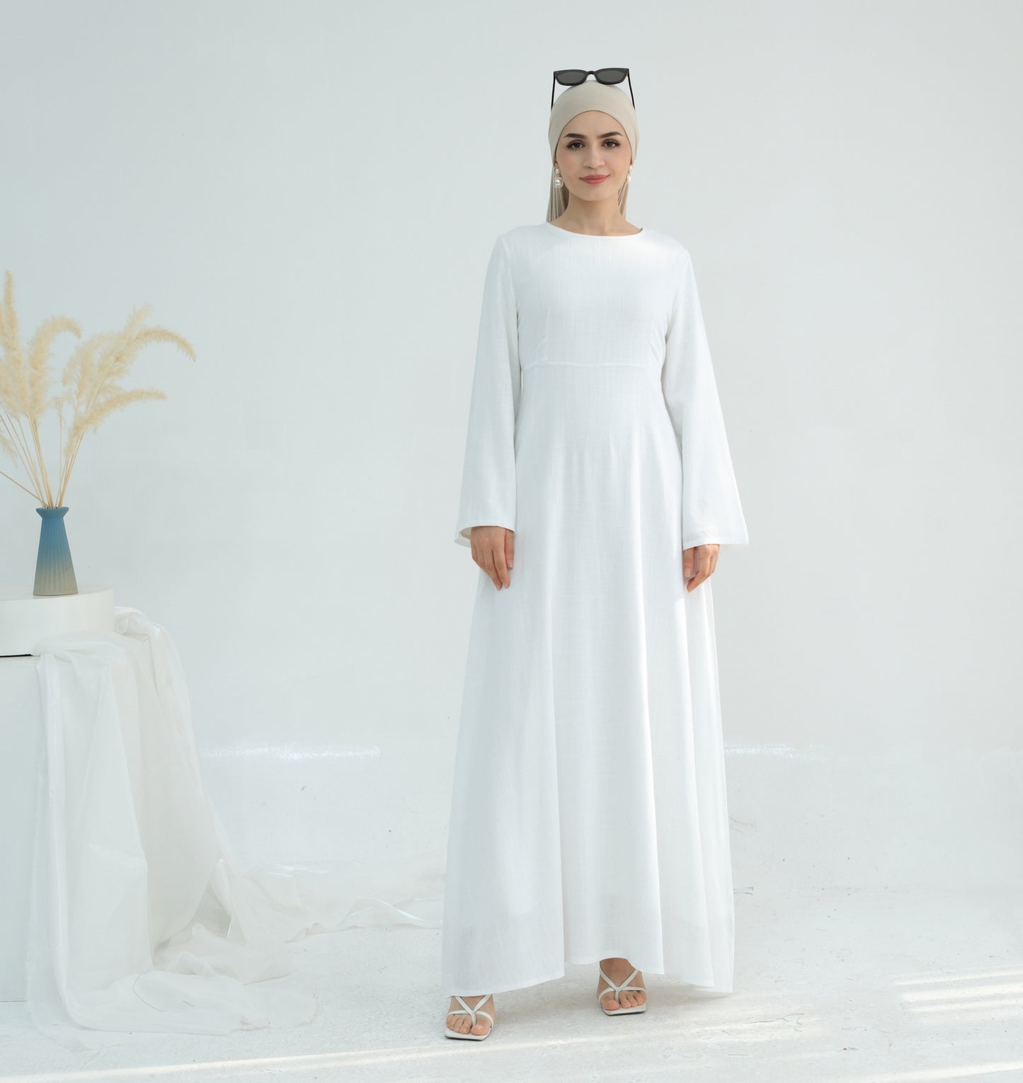 Robe maxi élégante pour dames avec des manches longues et des poches latérales Chic und Stil
