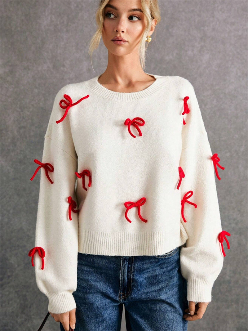 Pull femme avec des éléments de nœud décoratifs et une coupe moderne Chic und Stil