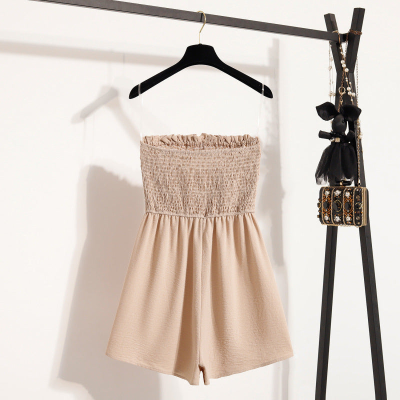Robe combinaison pour femmes avec taille accentuée par des boutons et haut élastique Chic und Stil