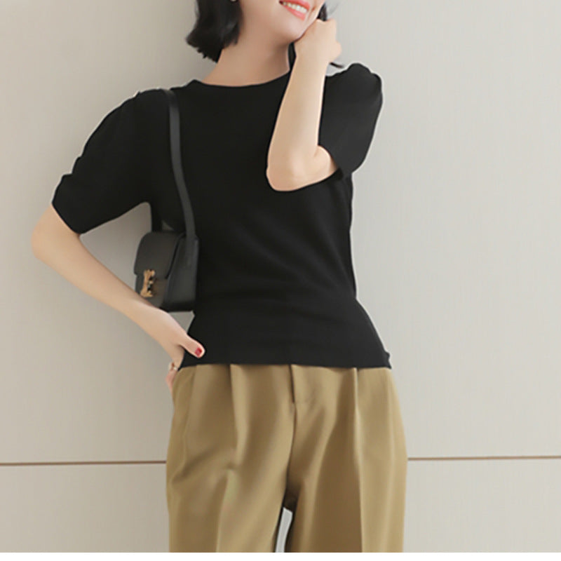 Haut en tricot à manches courtes pour femmes avec accents de boutons Chic und Stil