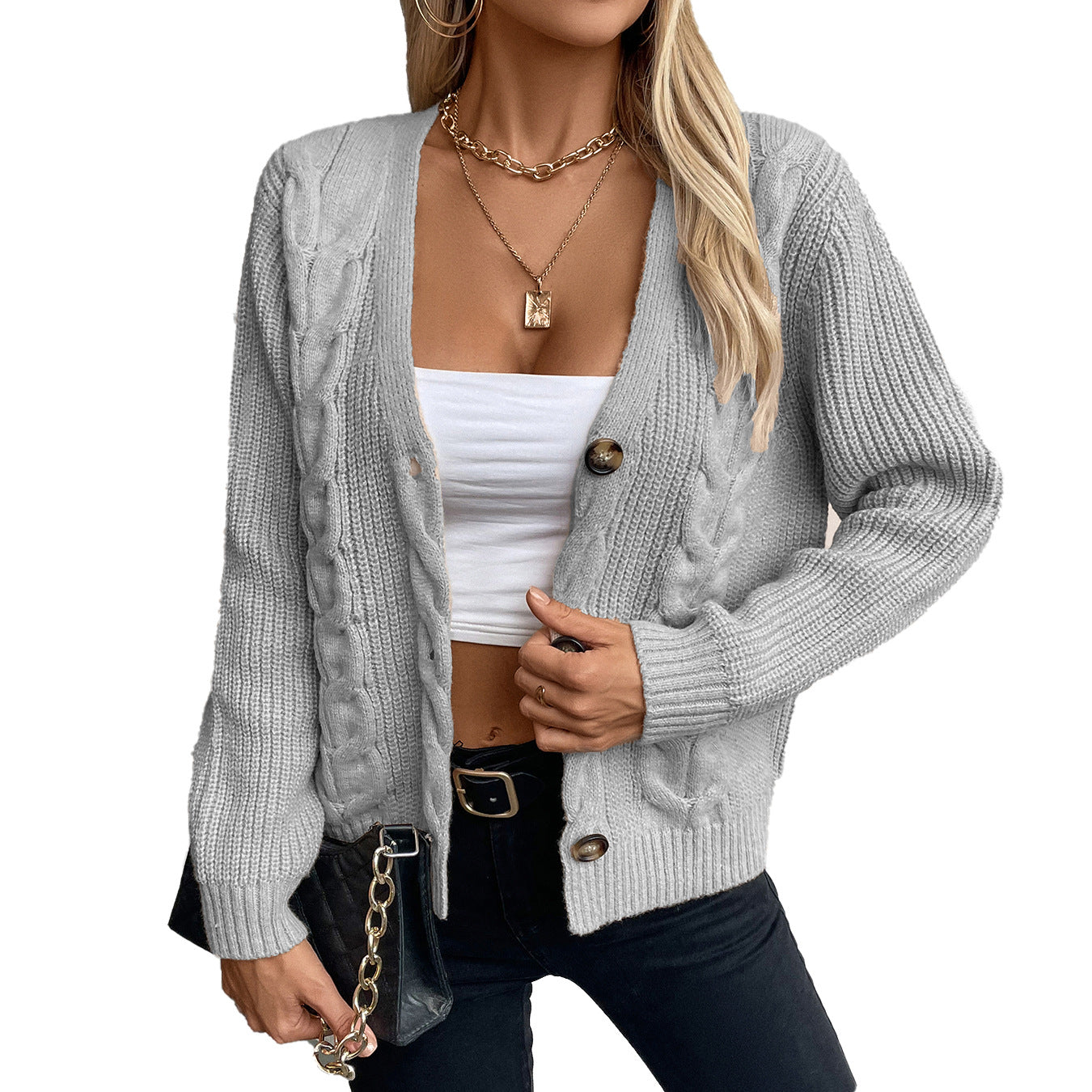 Cardigan pour femmes avec motif en torsade et détails de boutons Chic und Stil