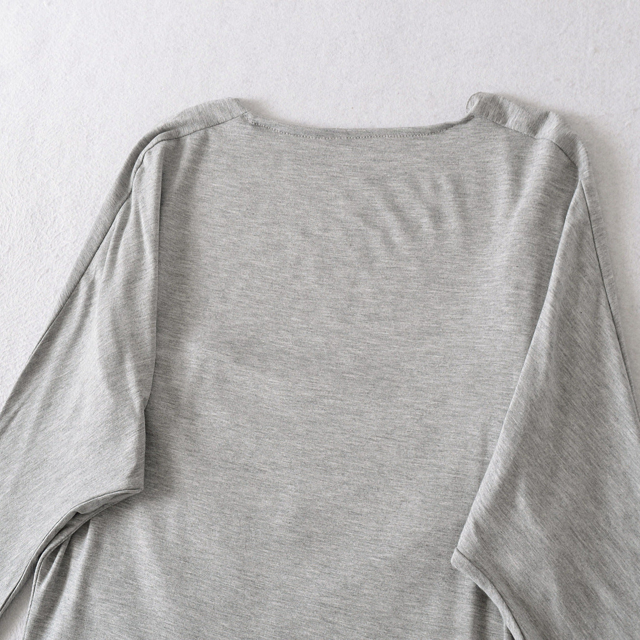 Chemise à manches longues décontractée pour femmes avec un design de drapé raffiné Chic und Stil