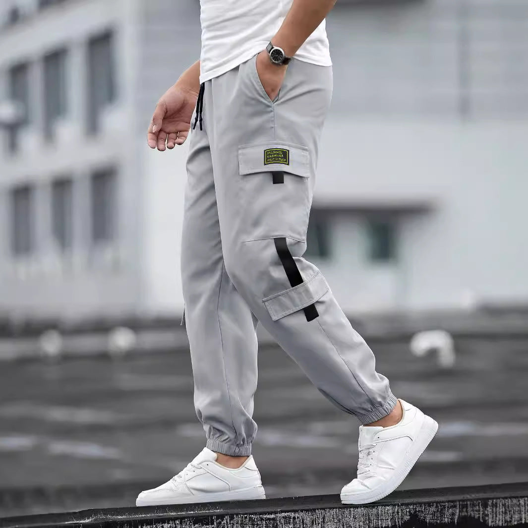 Pantalon cargo décontracté pour hommes avec taille ajustable et poches zippées pratiques Chic und Stil