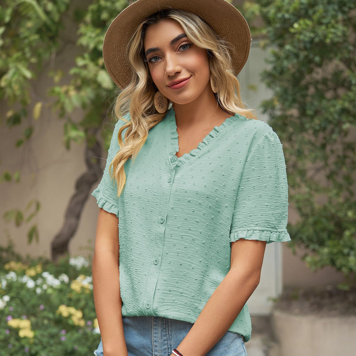 Women's blouse with ruffle details and light structured fabric Chic und Stil