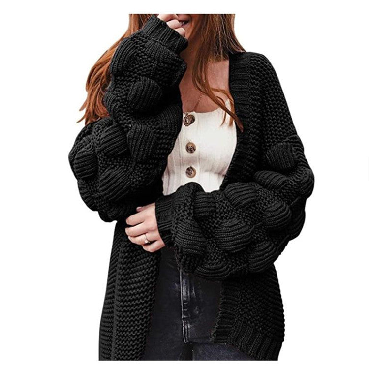 Veste en tricot pour femmes avec des manches bouffantes volumineuses et un aspect de maille structuré Chic und Stil