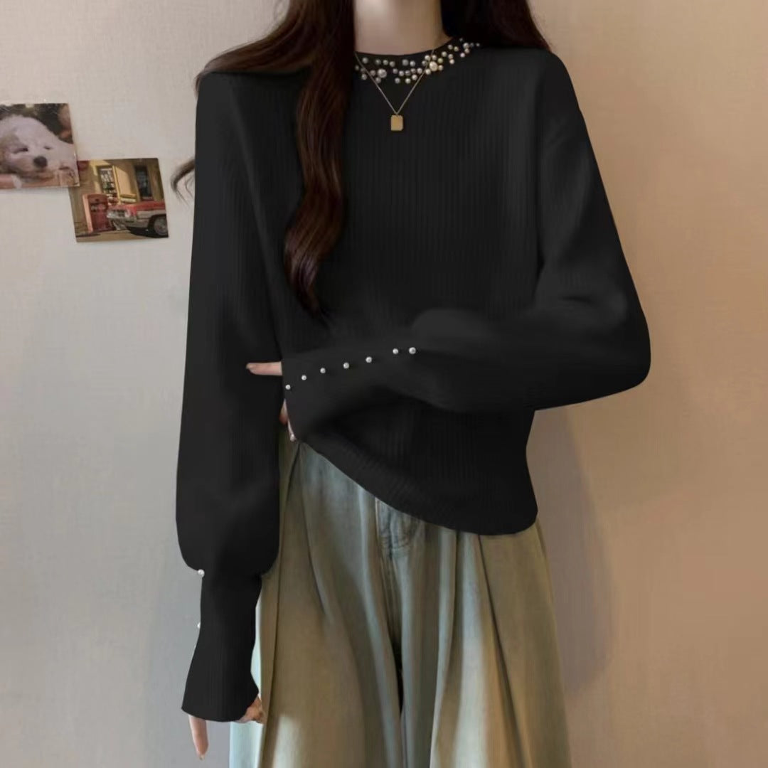 Dames pull élégant avec des détails ornés de perles Chic und Stil