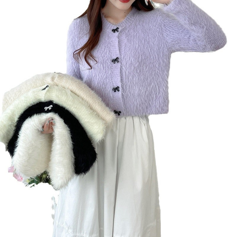 Dames pull-over en laine moelleux avec des boutons décoratifs en nœud Chic und Stil