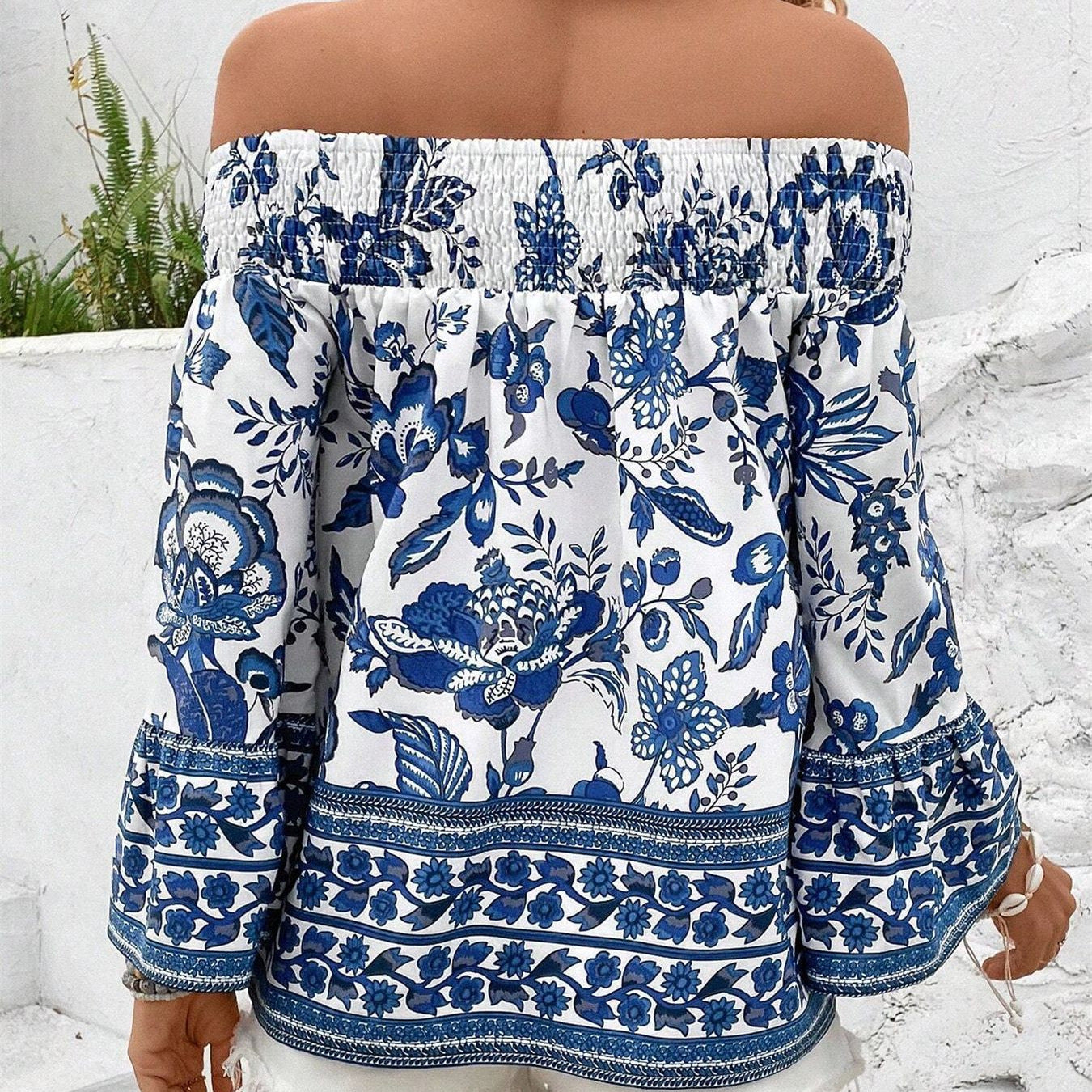 Blouse femme décolletée avec motifs floraux et bord élastique Chic und Stil