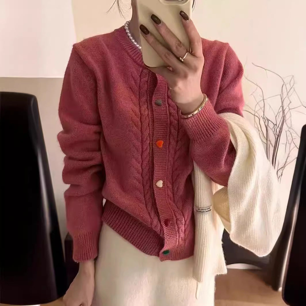 Cardigan pour femmes avec motif en relief et détails de boutons colorés Chic und Stil