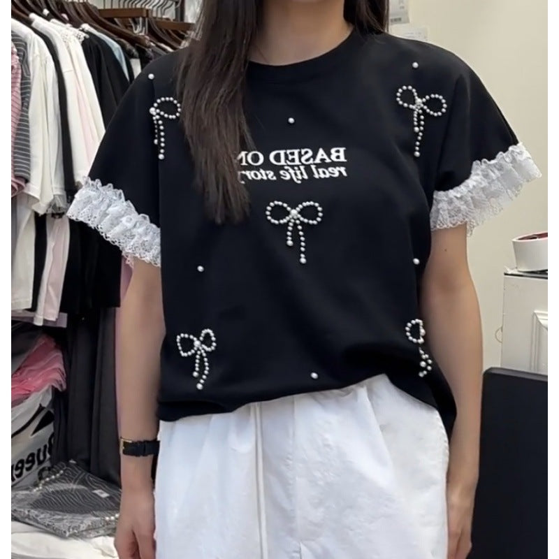 T-shirt graphique décontracté pour femmes avec accents en dentelle Chic und Stil