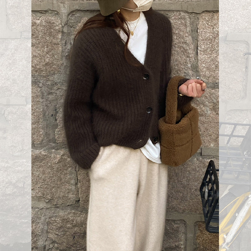 Dames Pull-over en tricot douillet avec de gros boutons Chic und Stil