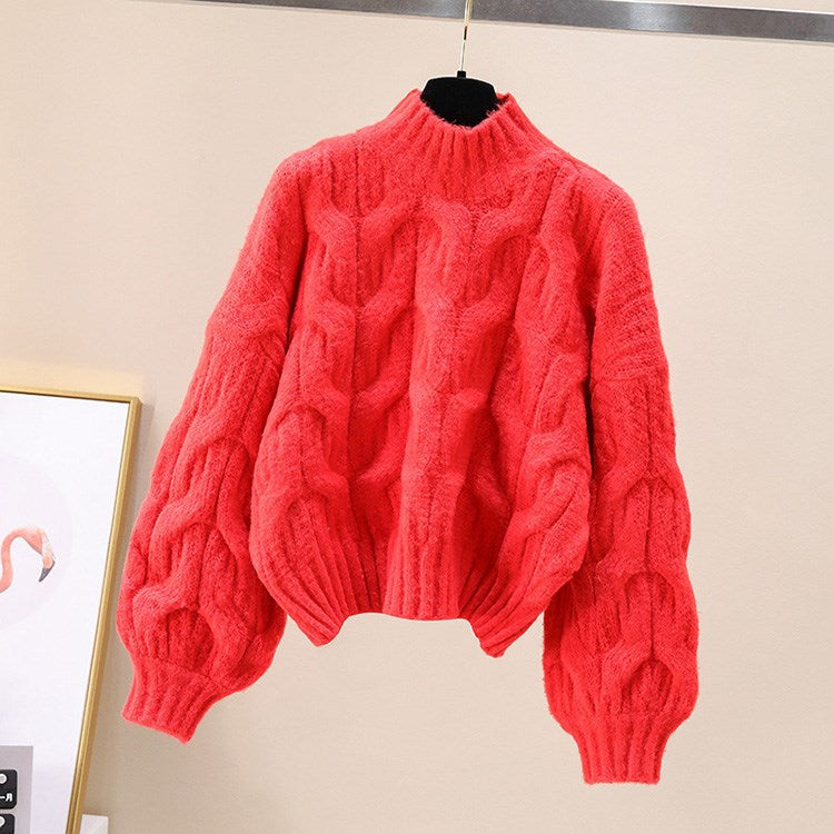 Pull en tricot confortable pour femmes avec des manches volumineuses et un motif torsadé Chic und Stil