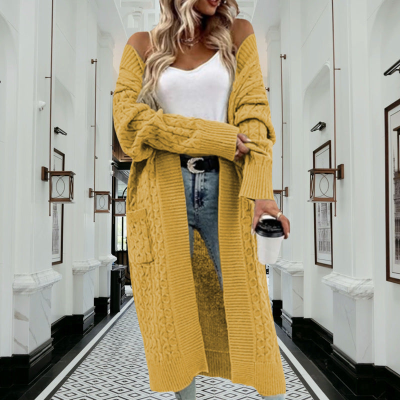 Veste en tricot pour femmes avec design de grosses tresses et poches pratiques Chic und Stil