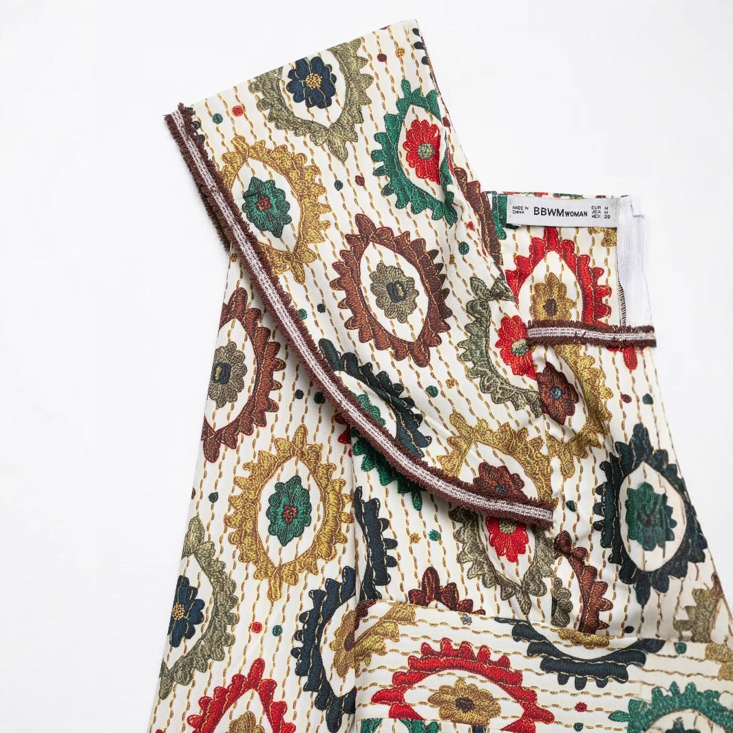 Robe midi pour femmes avec un mélange de motifs élégant et un col volumineux Chic und Stil