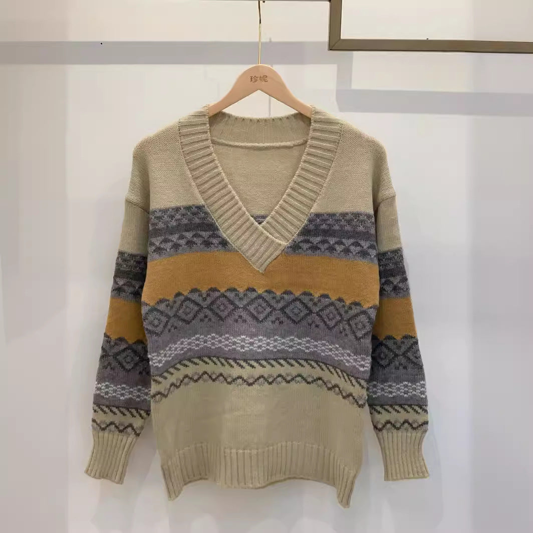 Pull en tricot pour femmes avec un design graphique moderne et décolleté en V Chic und Stil
