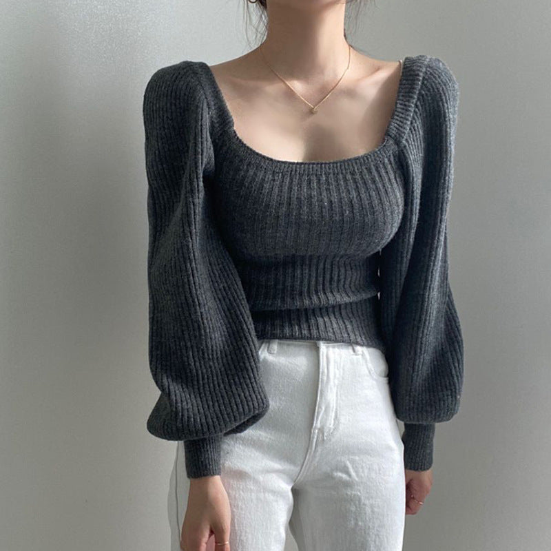 Femme Pull cropped avec des manches volumineuses et une structure côtelée Chic und Stil